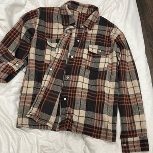 Women’s size medium button up flannel jacket. Not sure of the brand.